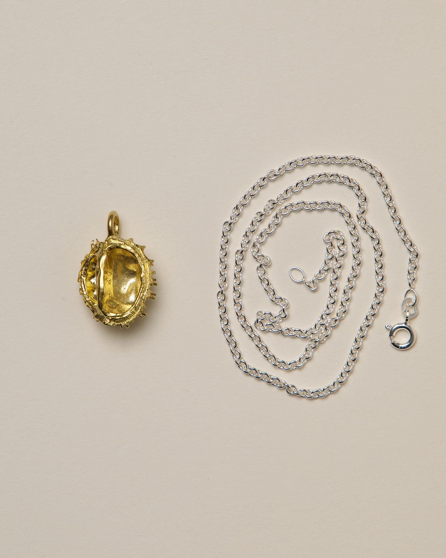 Chestnut pendant, brass
