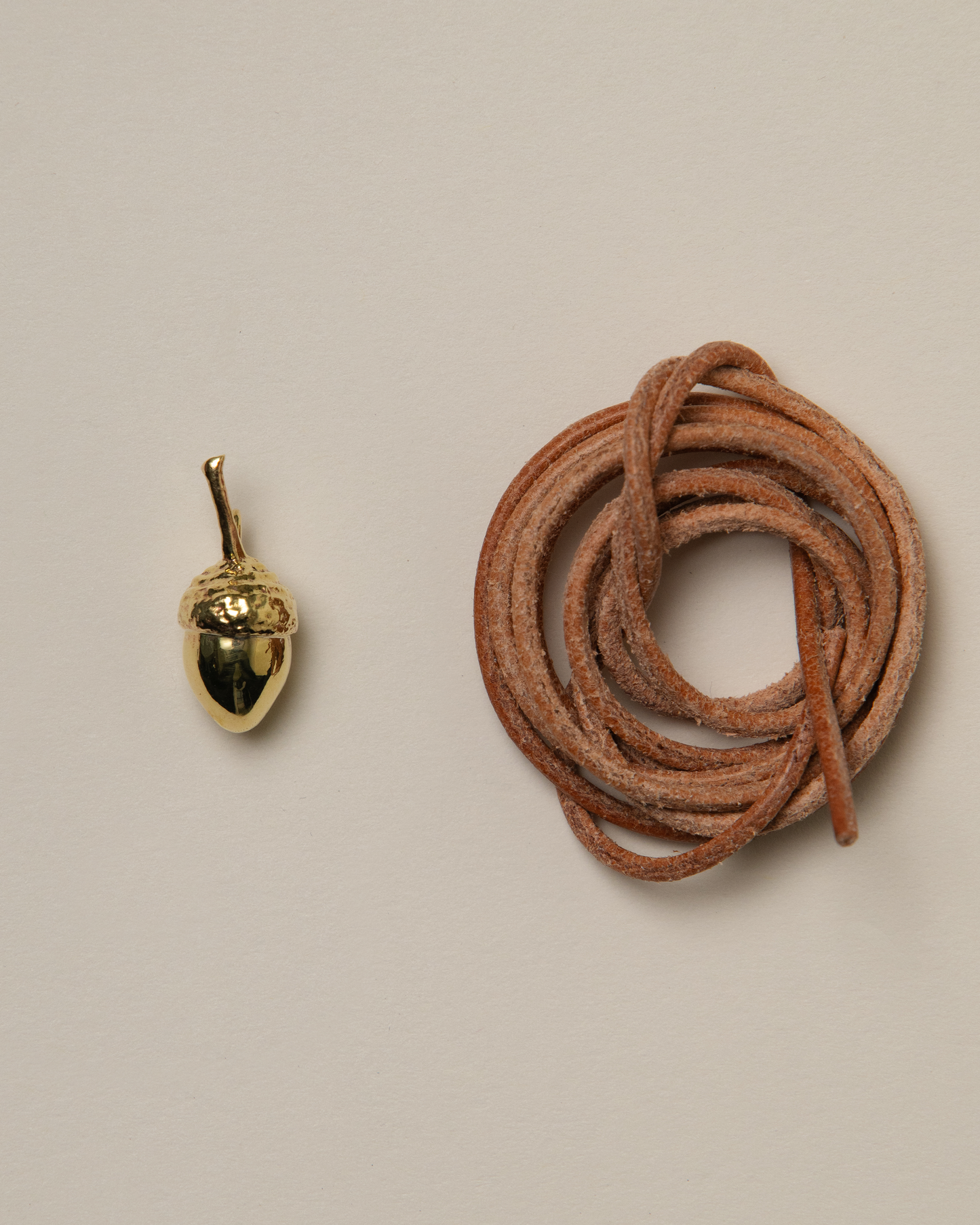 Acorn pendant, brass