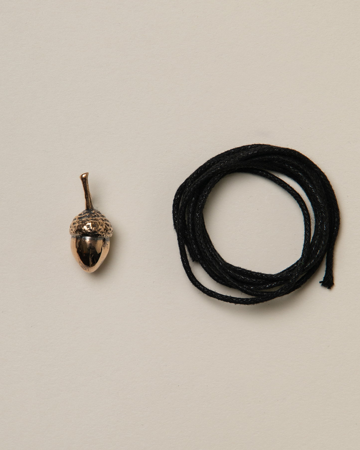 Acorn pendant, bronze