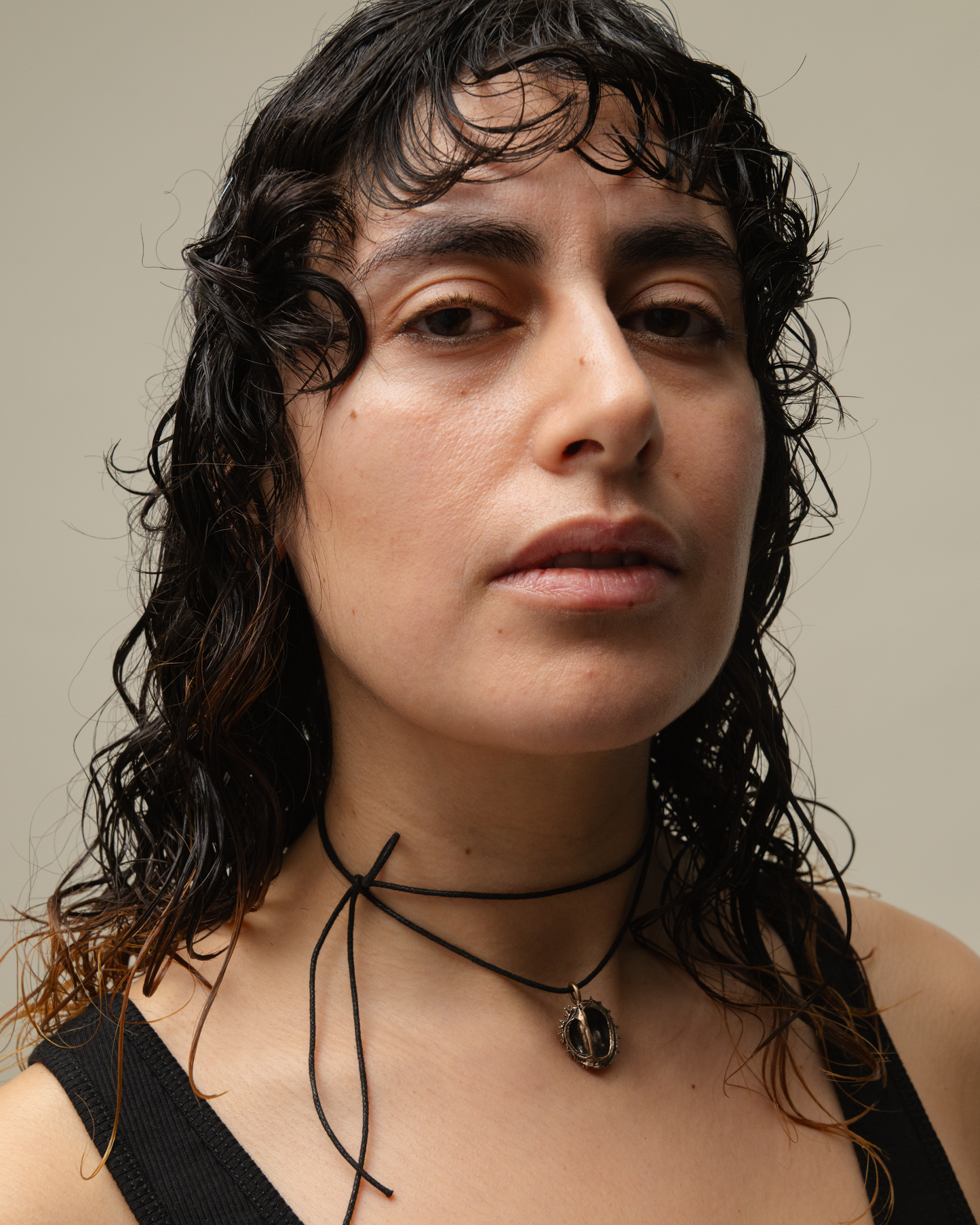 Chestnut pendant, bronze