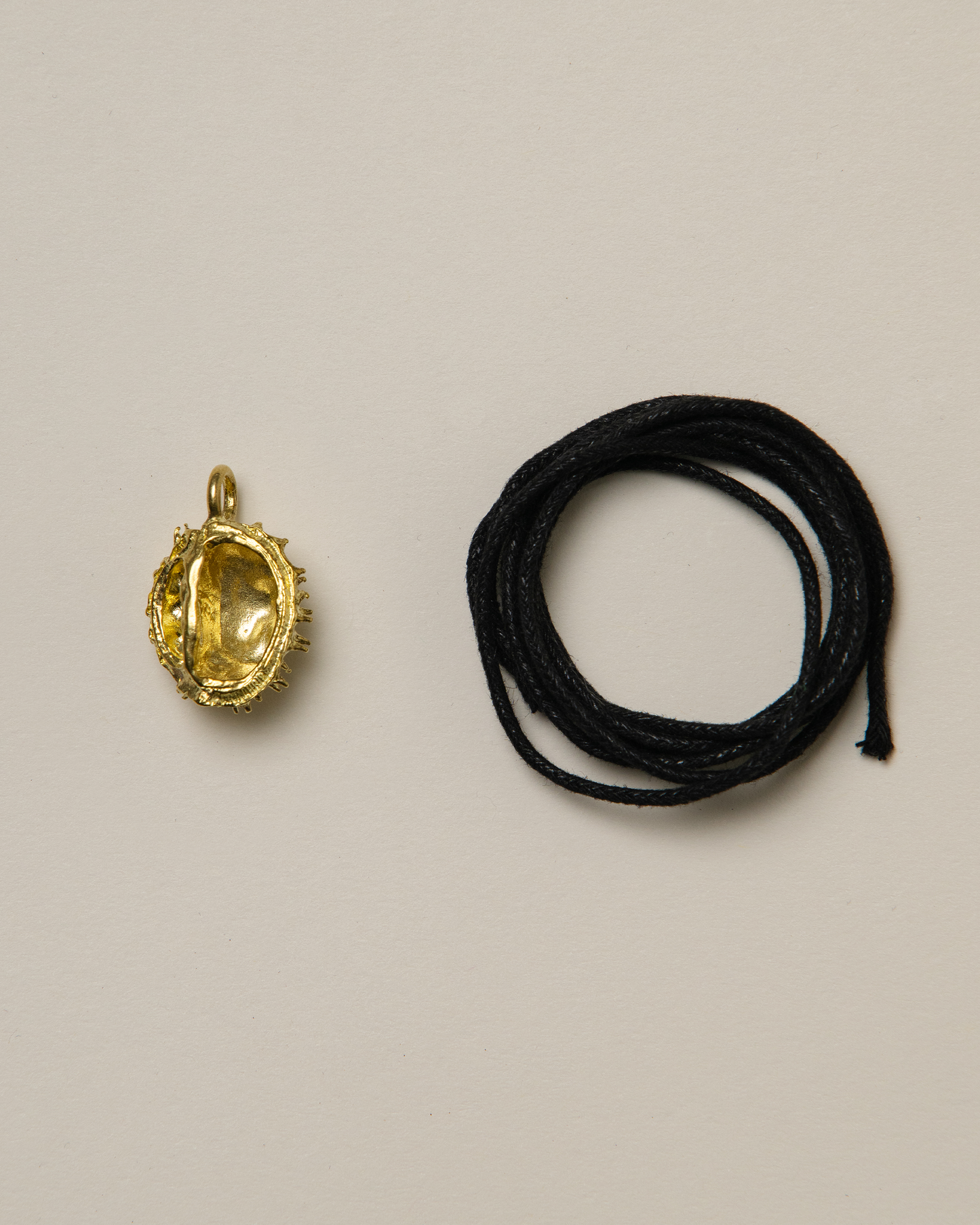 Chestnut pendant, brass