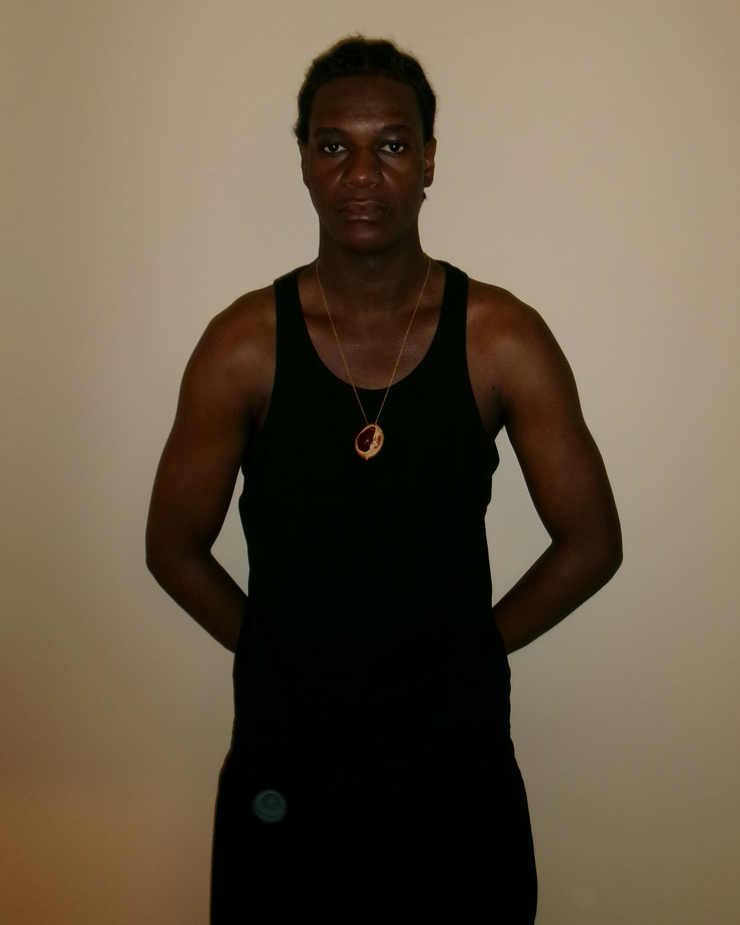 Chestnut shell with gold chain, red