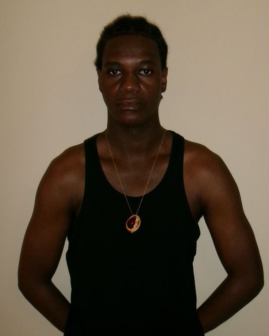 Chestnut shell with gold chain, red